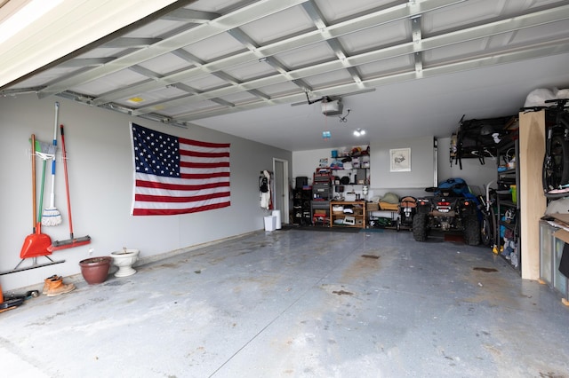 garage featuring a garage door opener