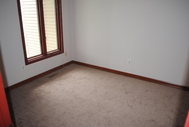 view of carpeted spare room