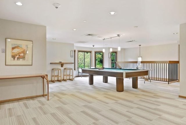 game room featuring pool table and light colored carpet