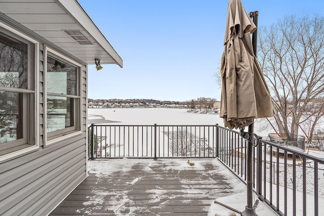 view of snow covered deck