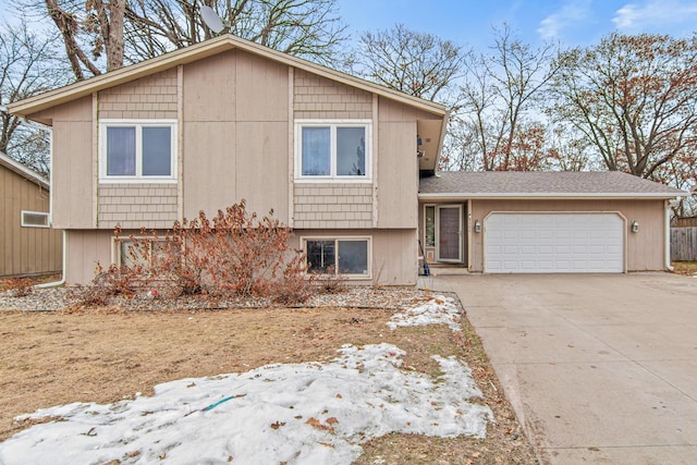 split level home with a garage