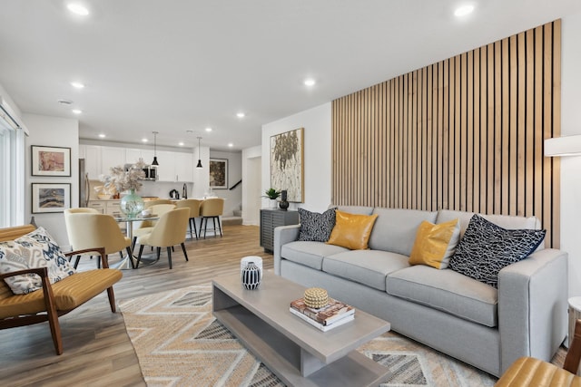 living room with light hardwood / wood-style floors