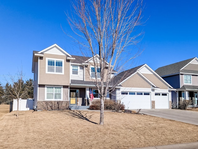 craftsman inspired home with a garage