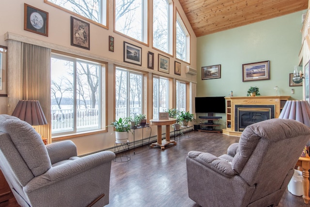 living room featuring wood ceiling, a baseboard radiator, high vaulted ceiling, an AC wall unit, and dark hardwood / wood-style floors