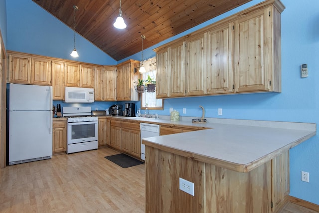 kitchen with kitchen peninsula, light wood-type flooring, white appliances, vaulted ceiling, and pendant lighting