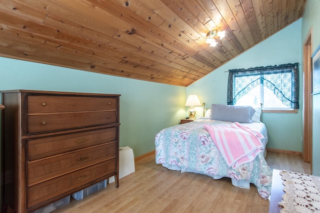 bedroom featuring wood ceiling, lofted ceiling, and light wood-type flooring