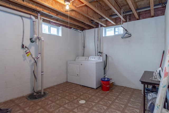 laundry area with plenty of natural light and independent washer and dryer