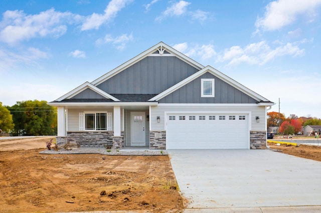 craftsman house with a garage