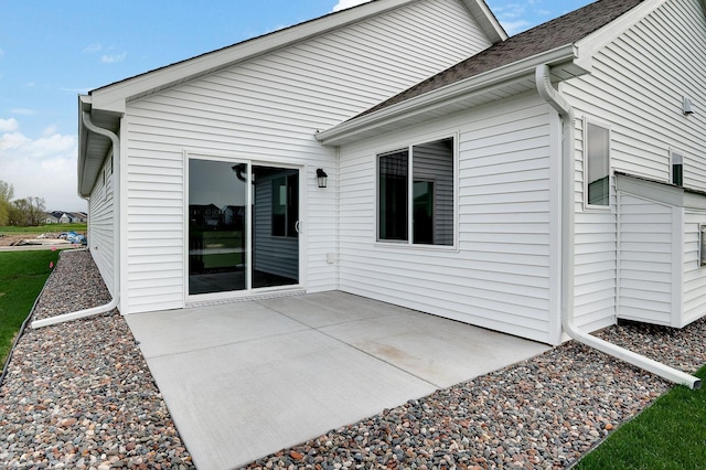 back of property featuring a patio area