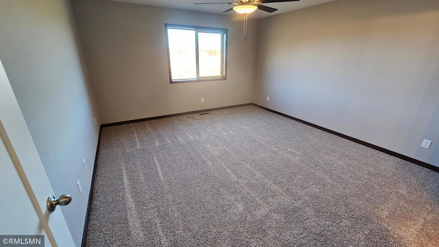 unfurnished room featuring carpet floors and ceiling fan