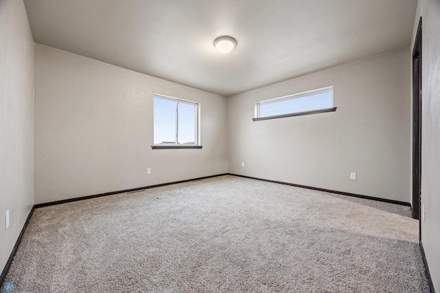 view of carpeted spare room