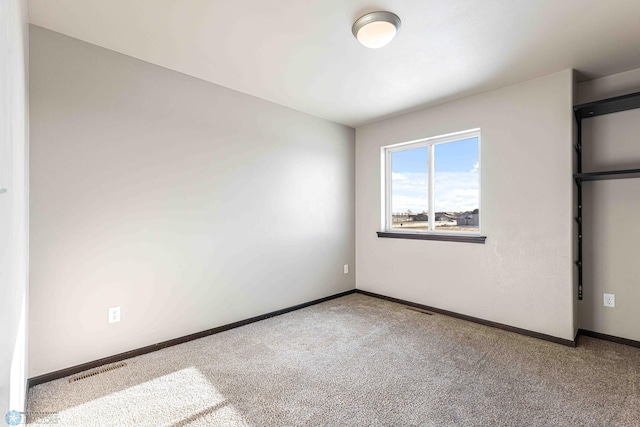 unfurnished bedroom with carpet floors