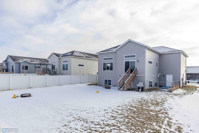 view of snow covered house