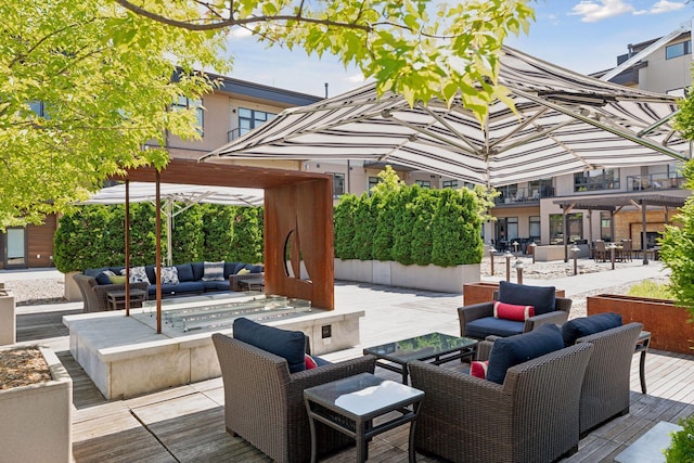 view of patio / terrace with outdoor lounge area and a pergola