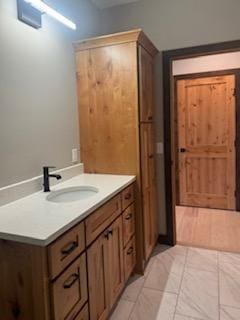 bathroom with vanity and tile patterned floors