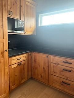 kitchen with light hardwood / wood-style flooring