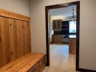 mudroom featuring light wood-type flooring