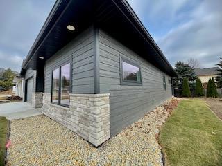 view of property exterior featuring a garage