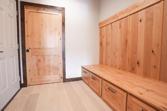 mudroom featuring light wood-style floors
