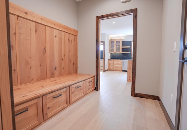 mudroom featuring baseboards, light wood-style floors, and recessed lighting