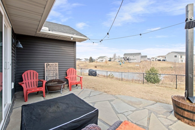 view of patio featuring a fire pit