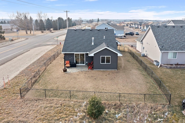 rear view of house with a patio