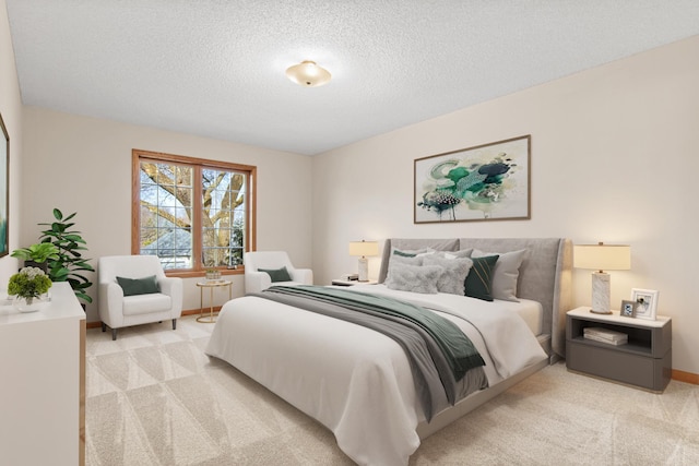 bedroom with baseboards, a textured ceiling, and light colored carpet