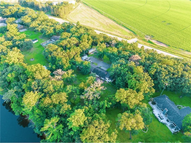 drone / aerial view with a rural view and a water view