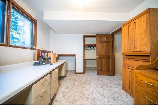 bathroom with a textured ceiling