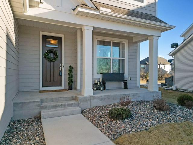 property entrance featuring a porch