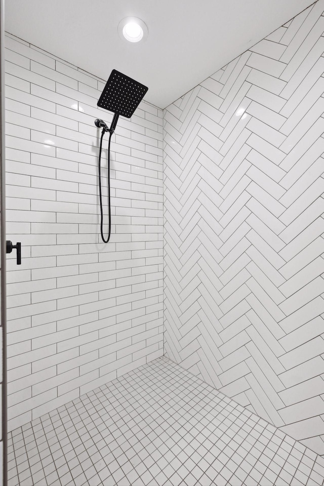 interior space with tiled shower