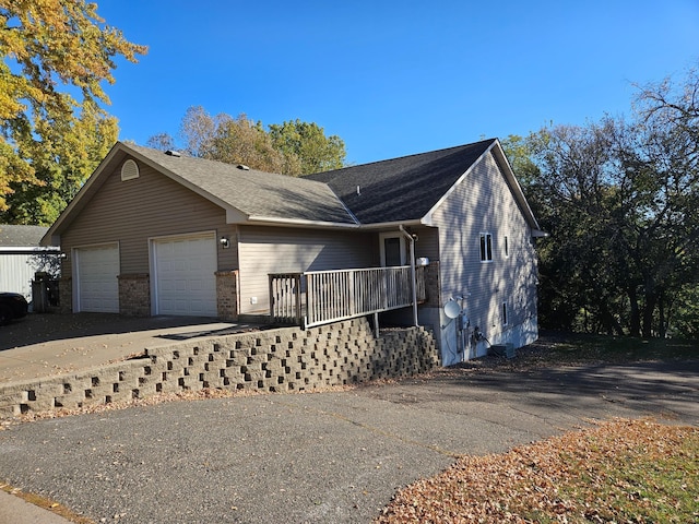 ranch-style house featuring a garage