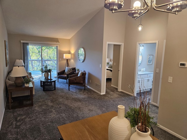 living room with dark colored carpet, high vaulted ceiling, and a notable chandelier