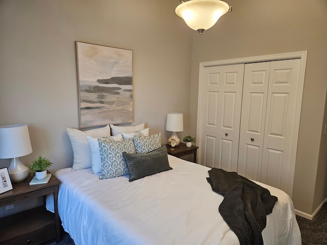 carpeted bedroom featuring a closet