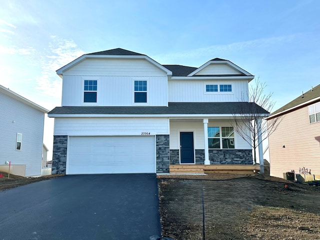 view of front of home featuring a garage