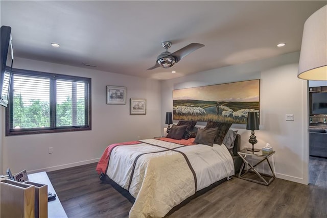 bedroom featuring ceiling fan and dark wood-type flooring