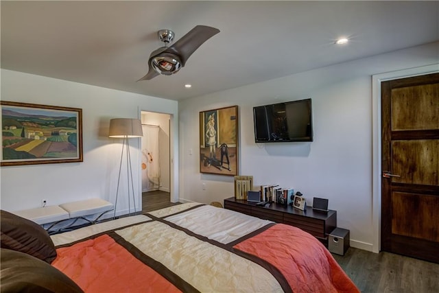 bedroom featuring ceiling fan and dark wood-type flooring