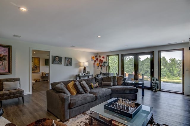 living room featuring hardwood / wood-style flooring and french doors