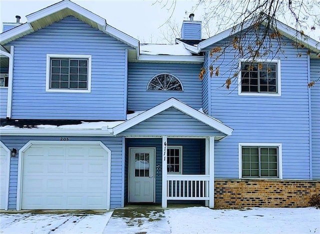 view of front of home with a garage