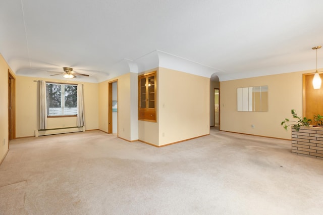 unfurnished room with ceiling fan, baseboard heating, and light carpet