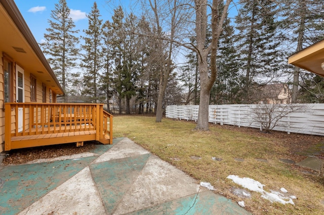 view of yard with a patio and a wooden deck