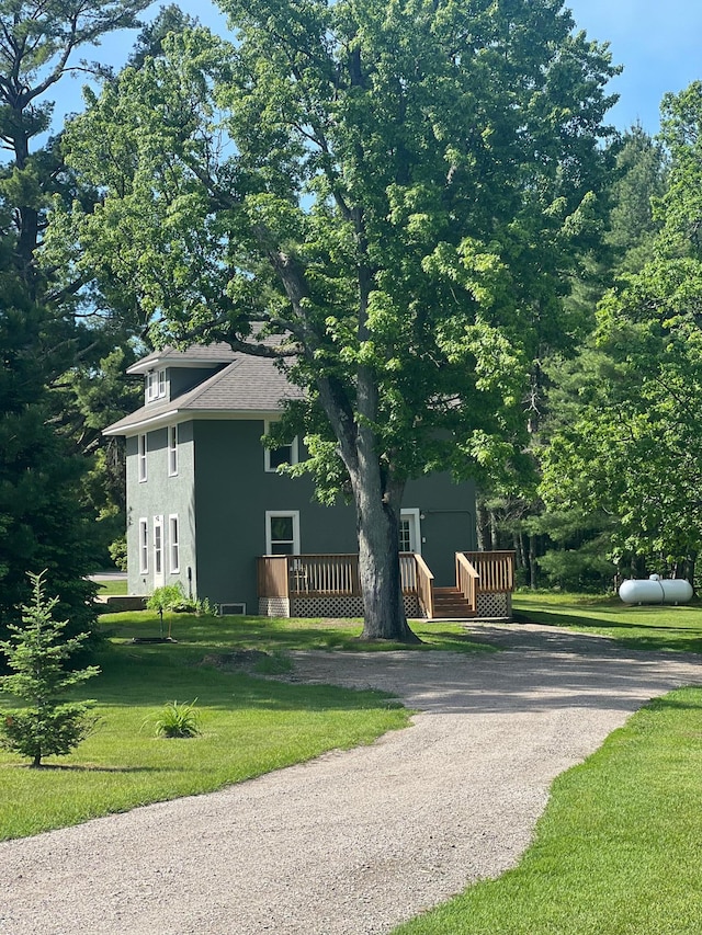 view of home's exterior featuring a yard