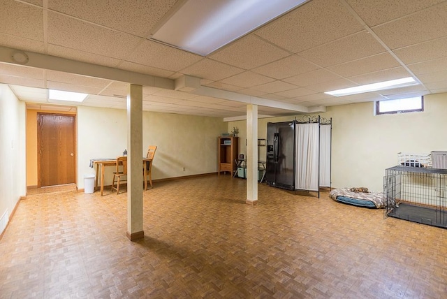 basement with a drop ceiling