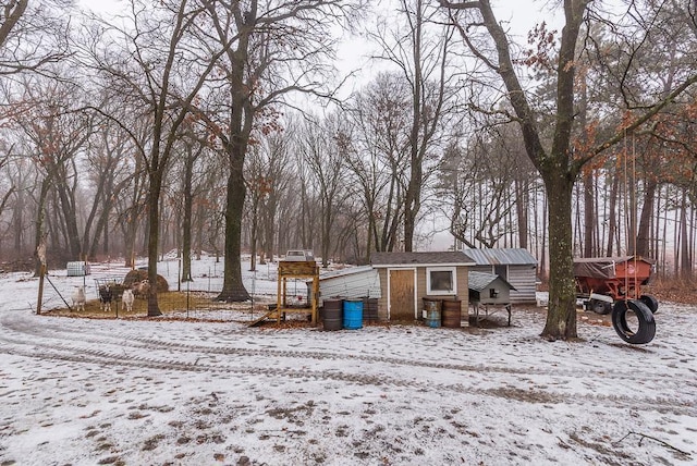 view of yard covered in snow