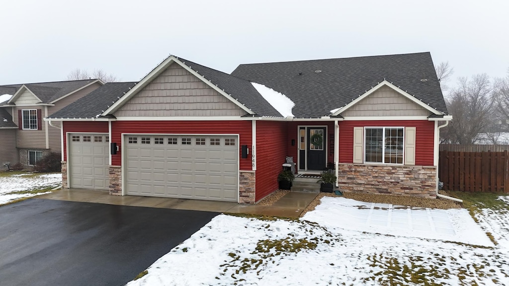 craftsman inspired home with a garage