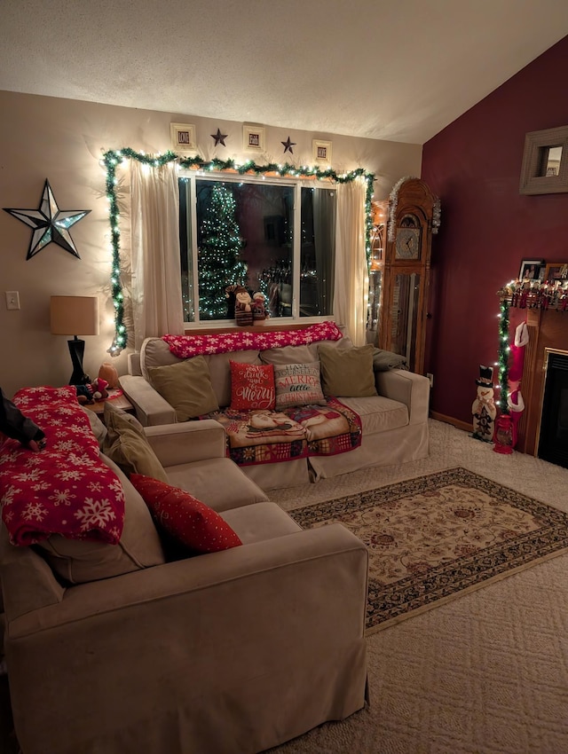 living room with a fireplace, carpet flooring, and vaulted ceiling