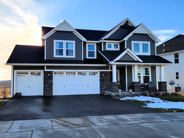 craftsman inspired home with a garage