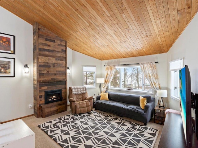 carpeted living room with lofted ceiling, a large fireplace, and wooden ceiling