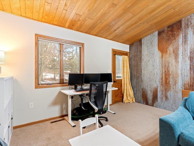 carpeted home office featuring wooden ceiling