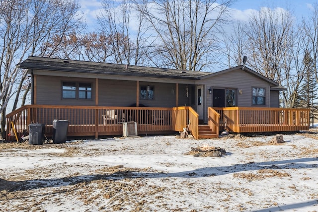 view of front of property featuring a wooden deck